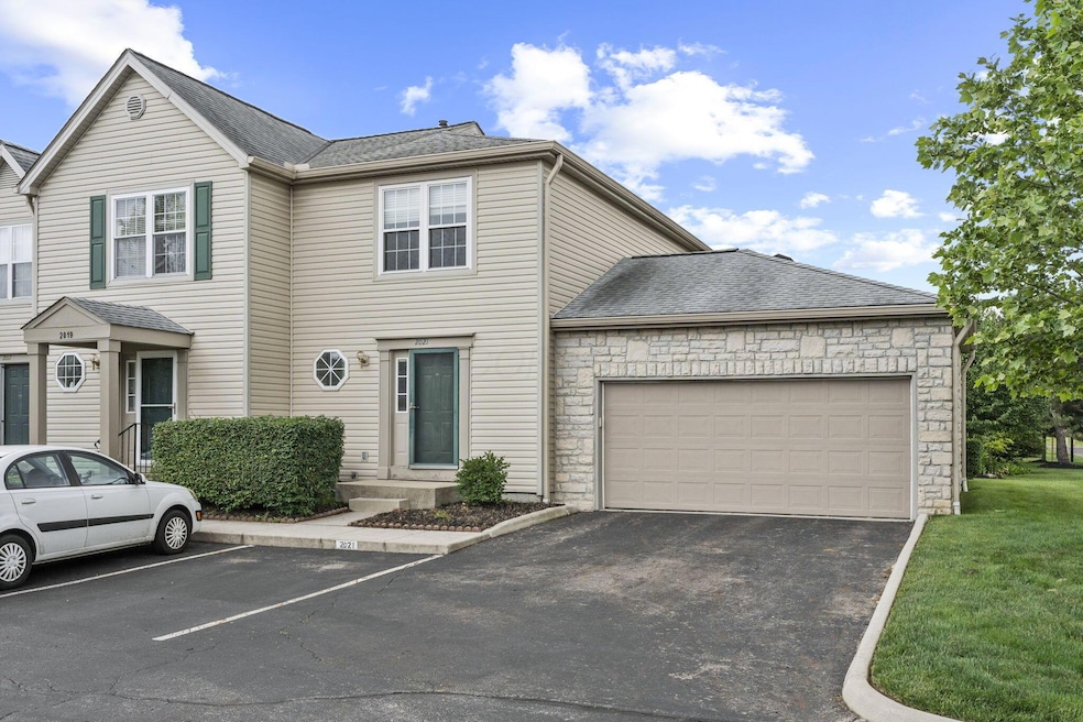End unit w 2 car garage