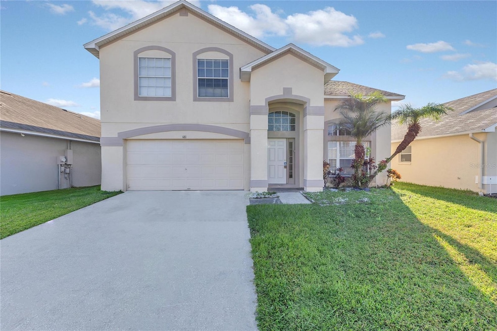 681 Eagle Pointe S, Kissimmee, FL 34746 - photo 1