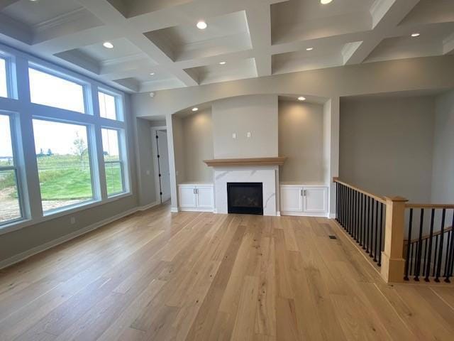 Move right into this brand New Home with warranties! Stunning gathering room with 12'H ceiling and coffered ceiling. landscaping, irrigation and sod coming soon! 4 bedrooms! Finished lower level with wet bar! Oversized 2-car garage