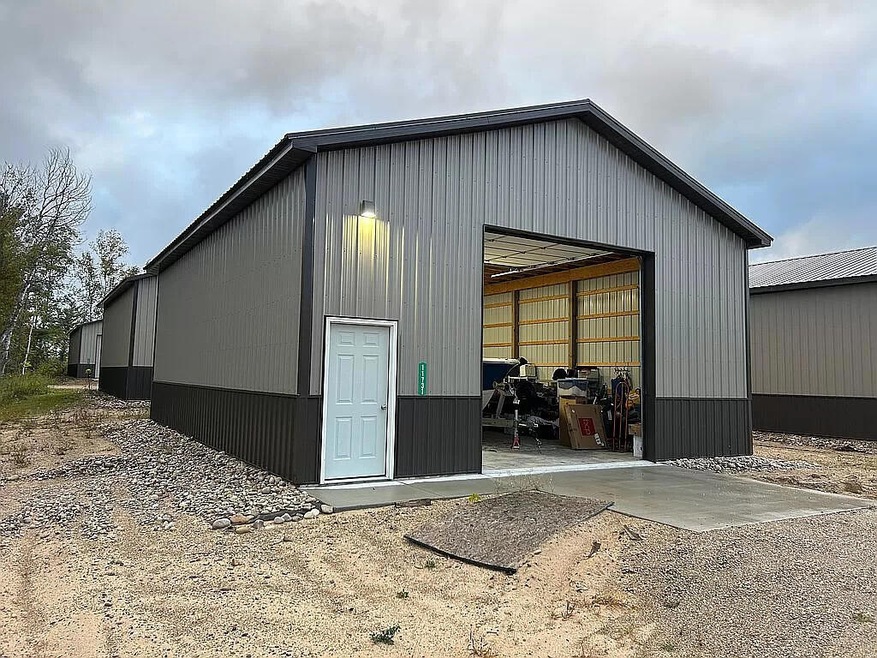 11731 N Star Dr unit C, Charlevoix, MI 49720 - photo 1