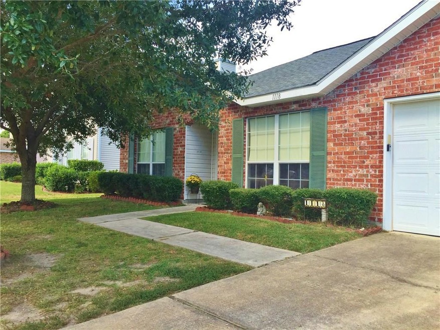 PRETTY BRICK HOME WITH TWO CAR GARAGE