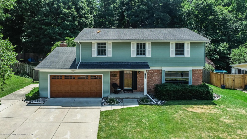 4933 Applewood Dr, Lansing, MI 48917 - photo 1