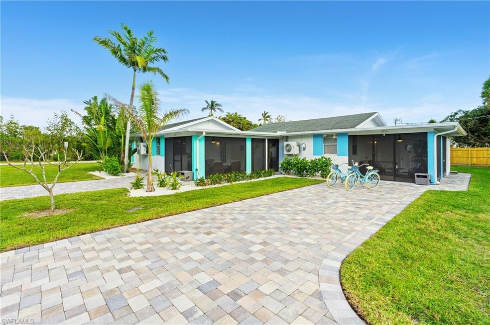 Spacious paver driveway leading to entrance, plent