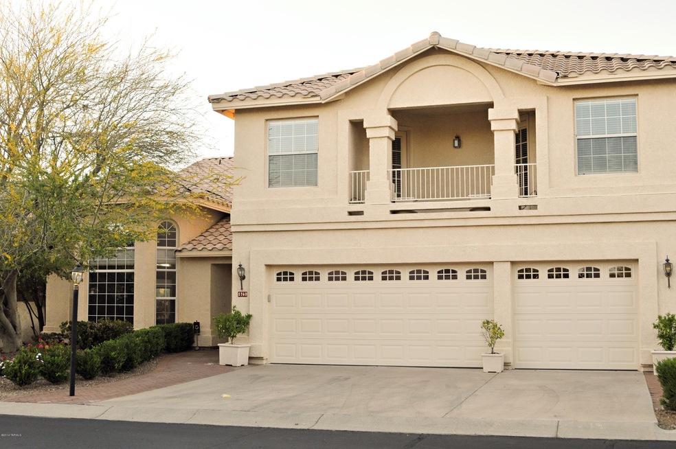Front view, tile roof, 3-car garage