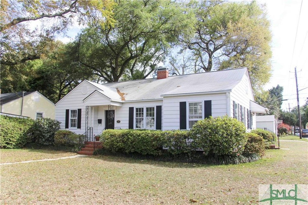 ADORABLE 1949 bungalow on a corner lot.