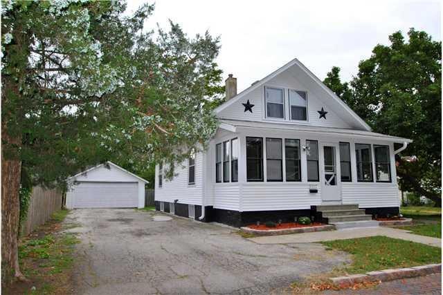 Exterior Front. New Siding & Gutters, 2 Car Garage