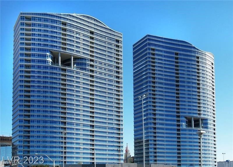 View of property with a cooling unit