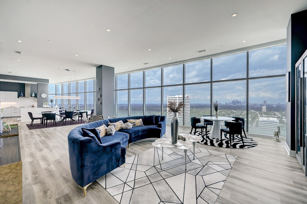 High ceilings on the 27th floor separate this excl