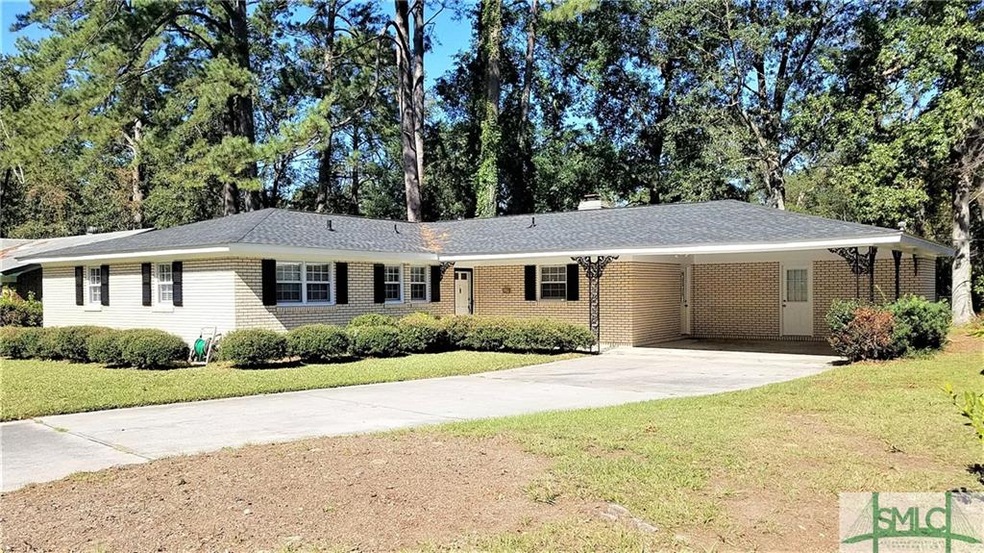 Front Exterior with double carport