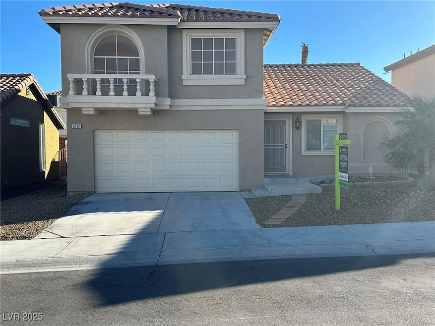 Mediterranean / spanish-style house with concrete driveway, stucco siding, a garage, and a tiled roof