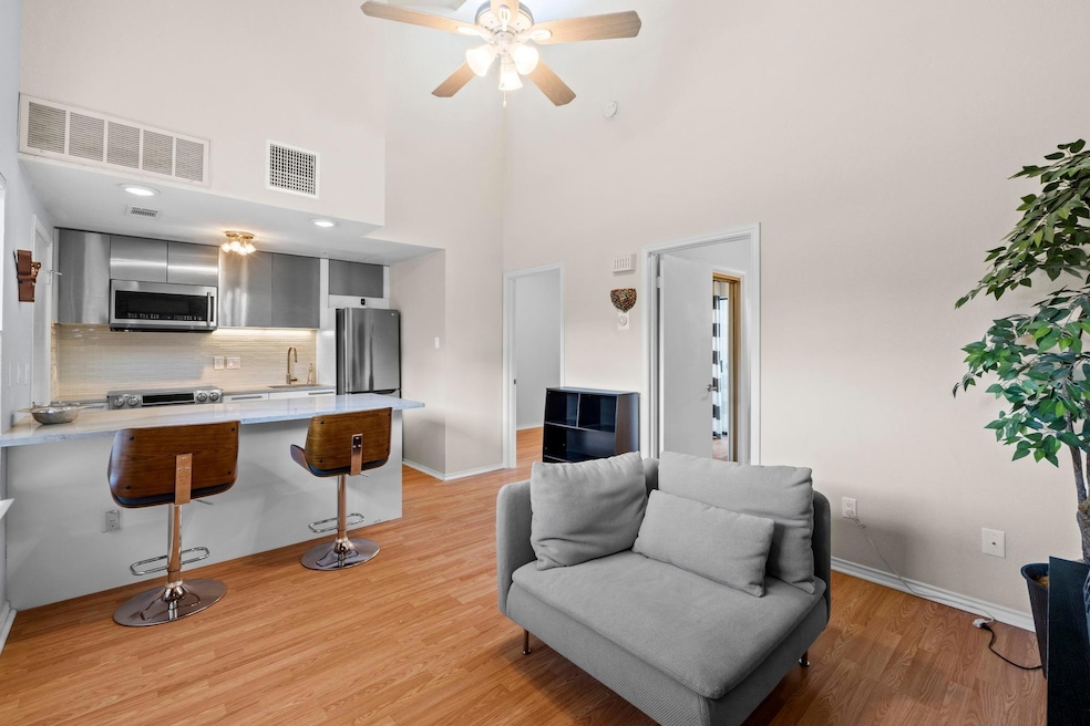 Living area featuring light wood-style flooring, 