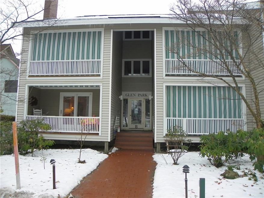 First floor porch on the left.