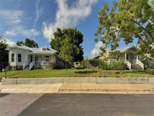 Home & Guest House + a studio on 3/4 acre fenced l