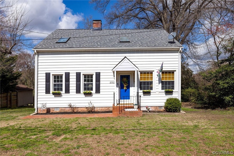 View of front of house with a front yard