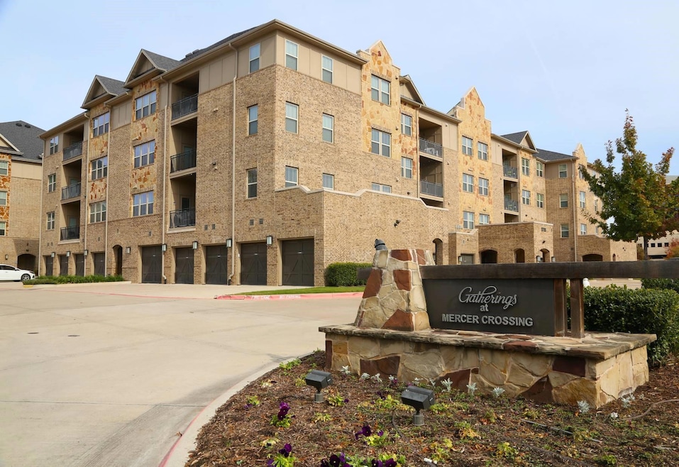 View of building exterior featuring a garage