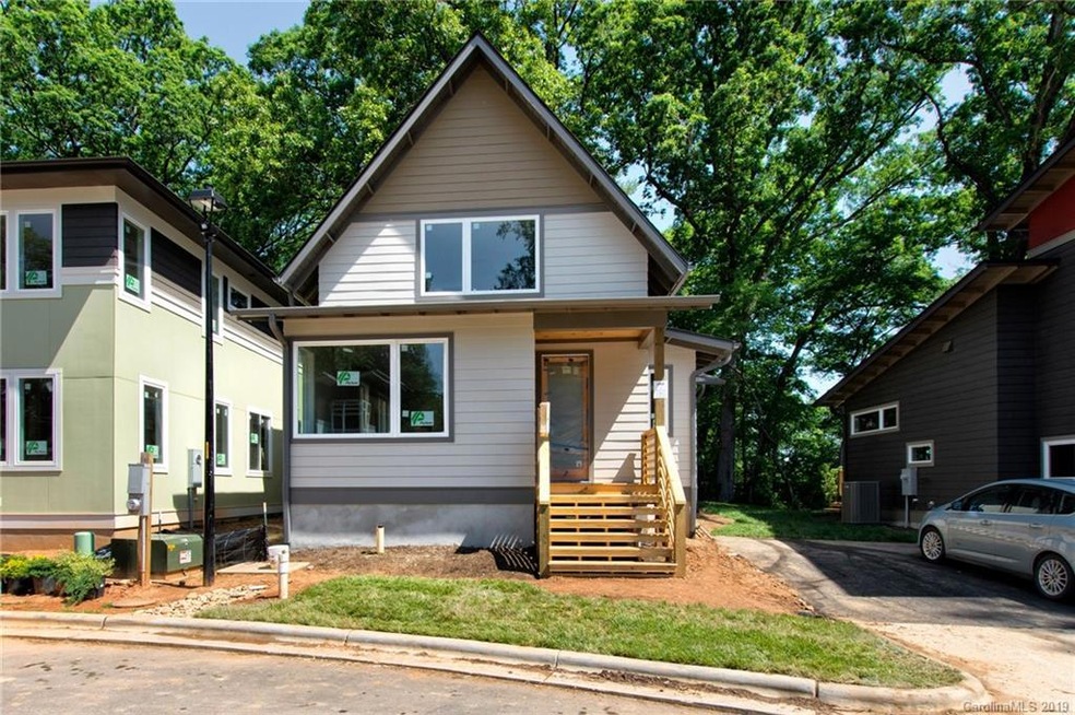 Under Construction and Almost Complete Bunting Model Home in Craggy Park