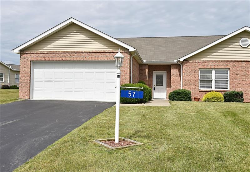 Enjoy one floor living in the spacious brick condo
