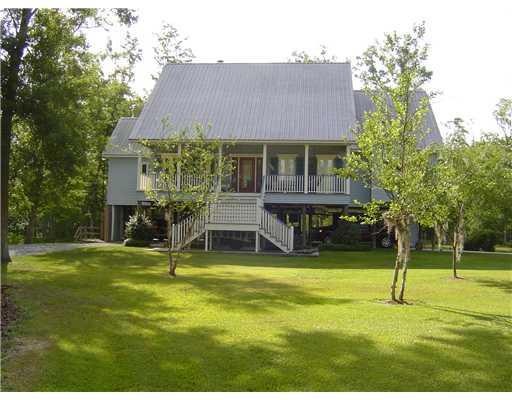 Photo. Raised Acadian on 1.49 acres located in bay