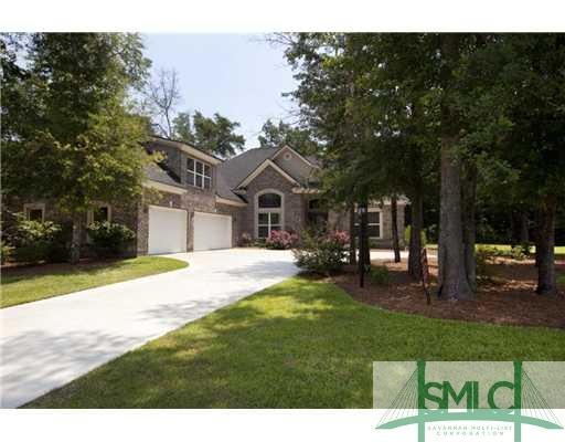 Exterior Front. Upgraded three car garage!!!  Full