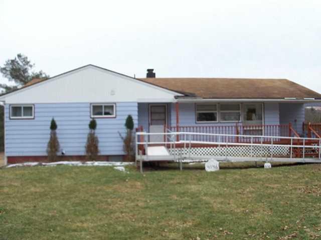 Exterior Front. Please note: Wheelchair ramp is no
