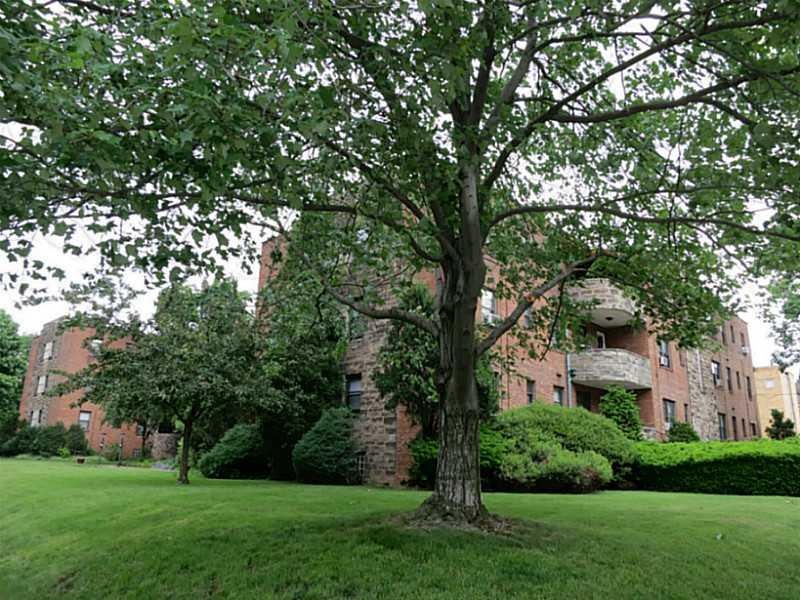 Exterior Front. Beautiful Garden Condominium Compl