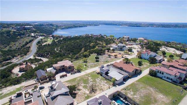 Lake living at its finest in the exclusively gated