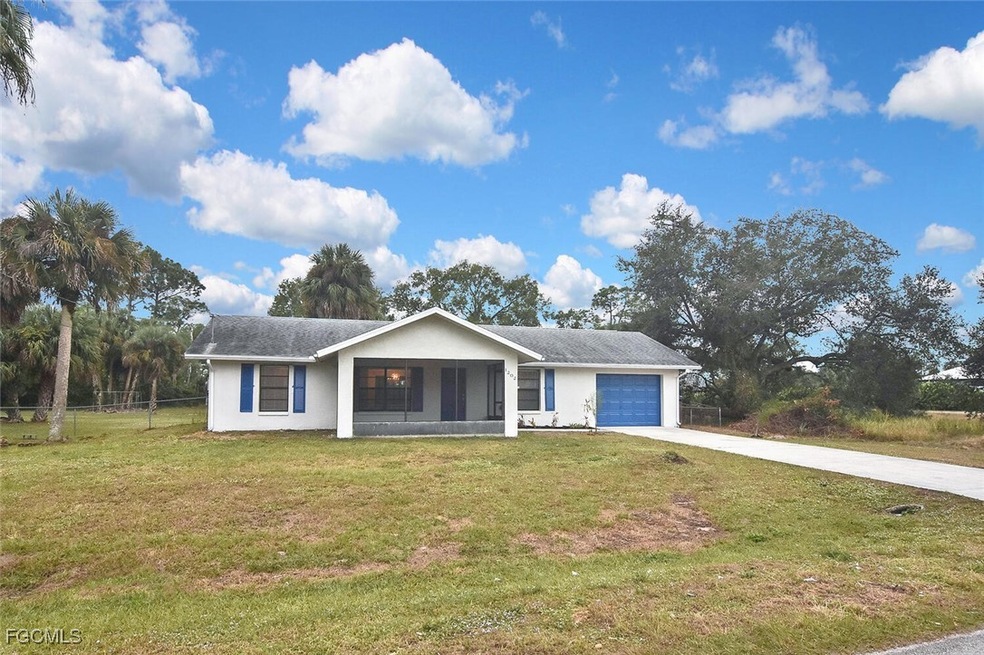1202 E 7th St, Lehigh Acres, FL 33972 - photo 1