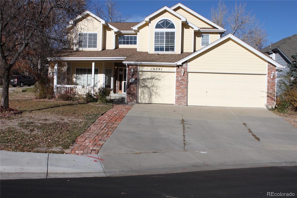 10791 Trailrider Pass, Littleton, CO 80127 - photo 1