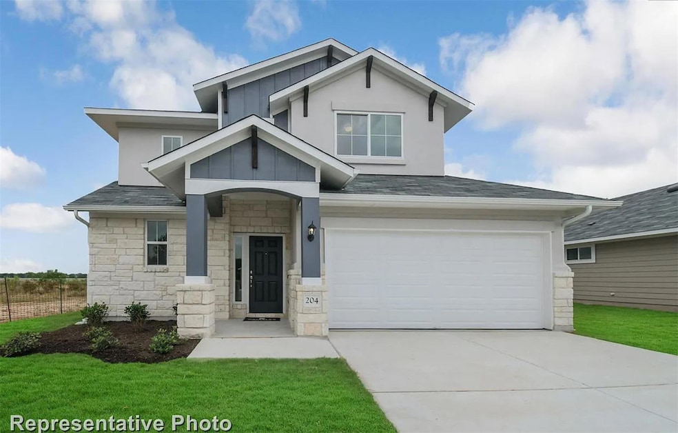 Craftsman-style house featuring stone siding, con