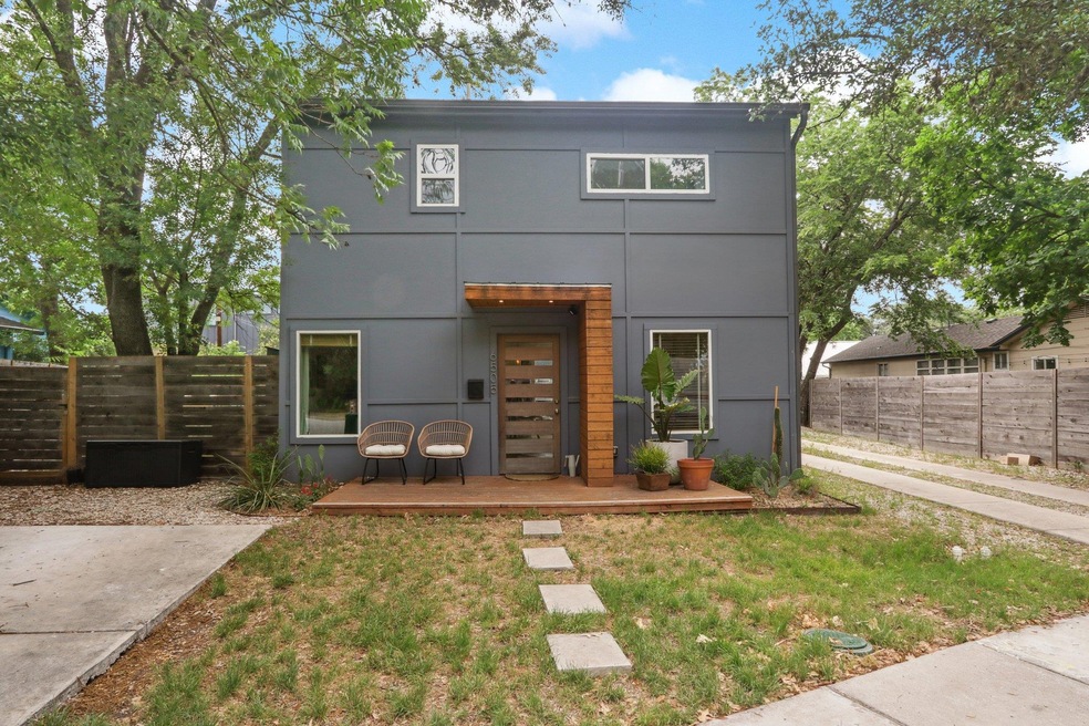 Contemporary home featuring stucco siding