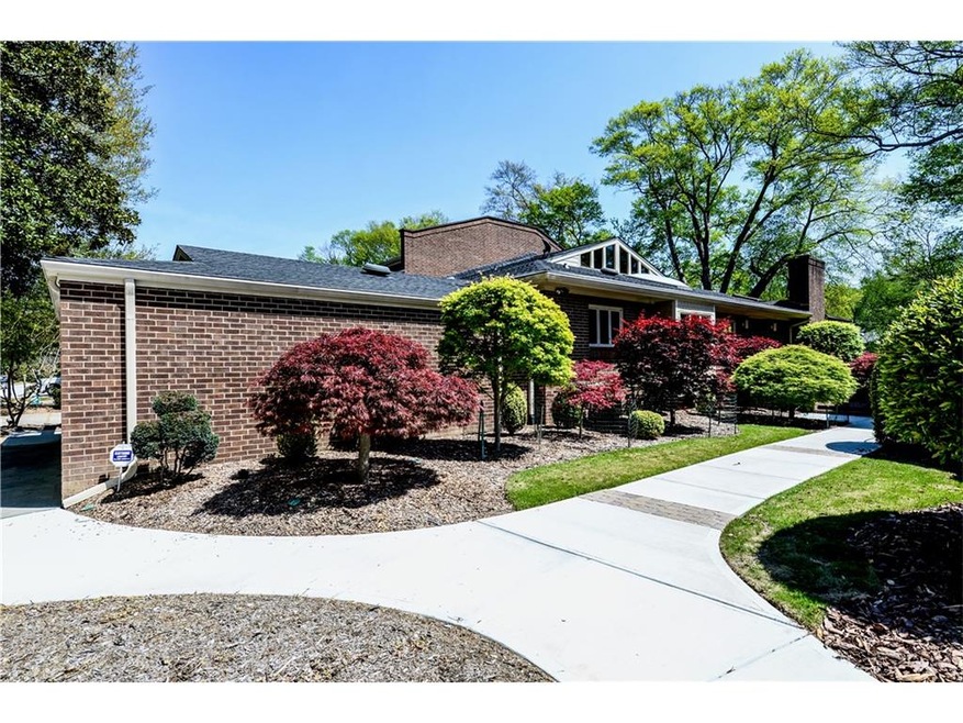 Stunning brick home with professional landscaping 