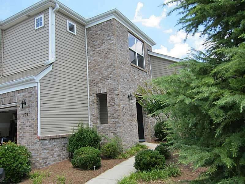 Exterior Front. Cluster Home Community.