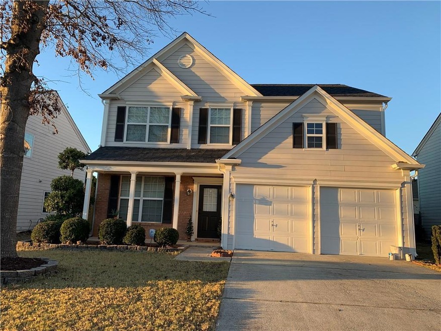 View of front facade featuring a front yard and a 