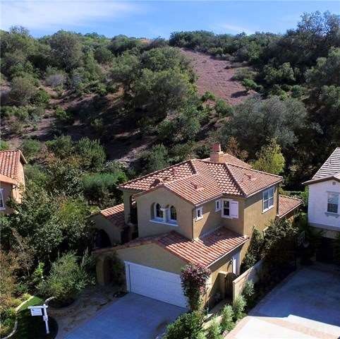 Beautiful home has very large back yard with wide 