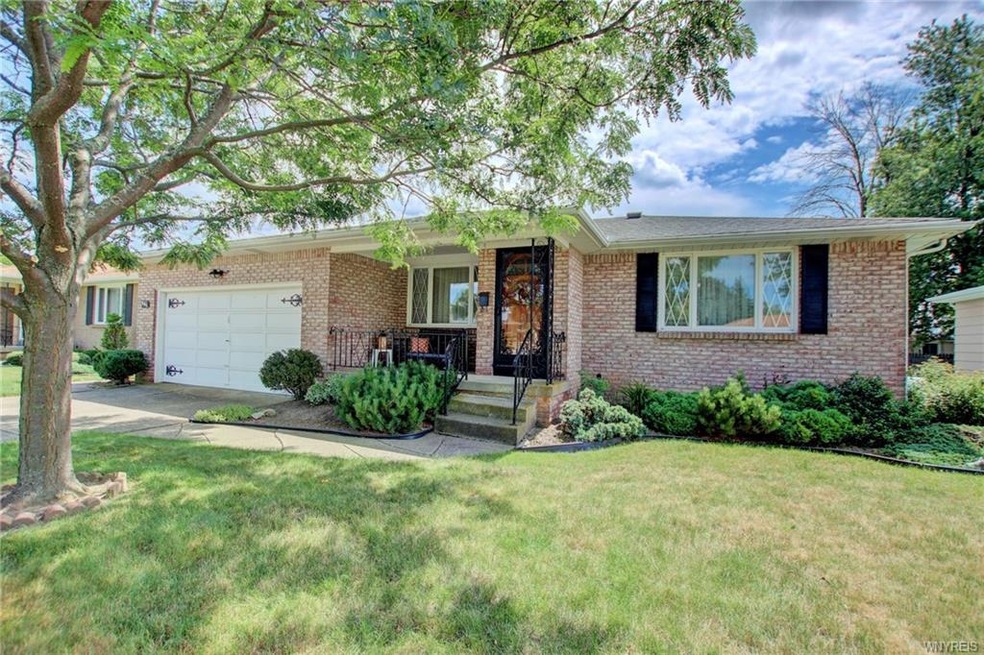 All brick ranch w/inviting covered front porch