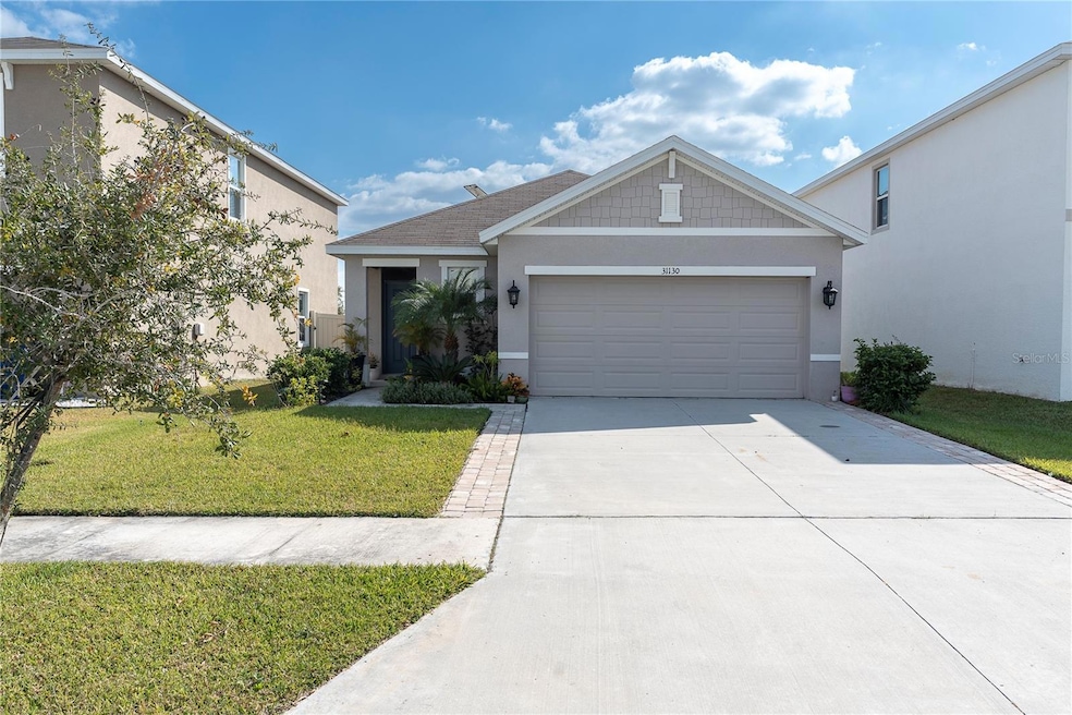31130 Penny Surf Loop, Wesley Chapel, FL 33545 - photo 1