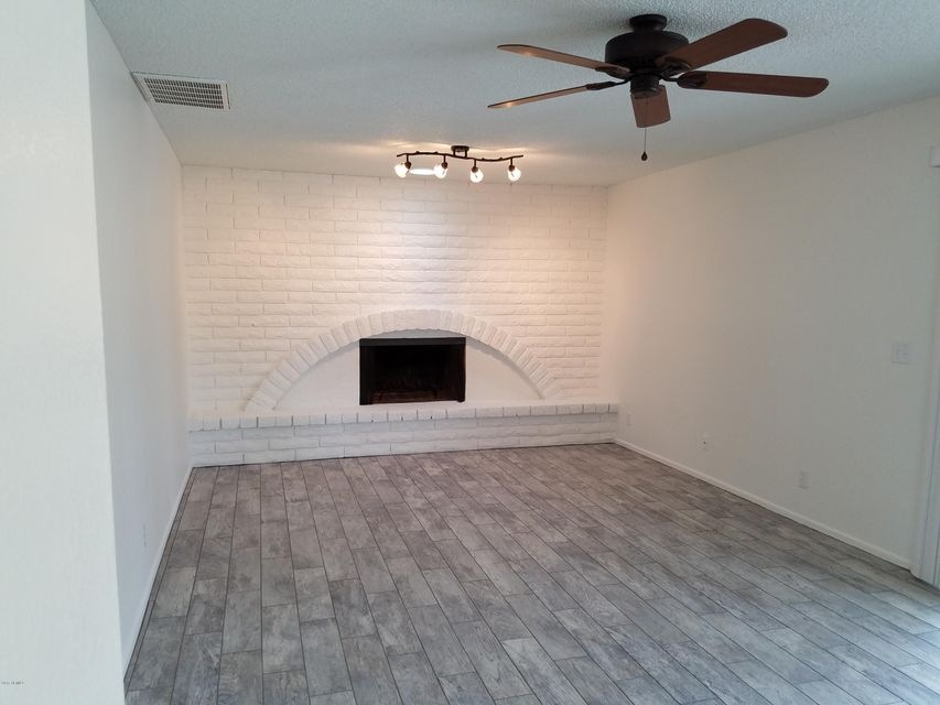 gorgeous fireplace and floors