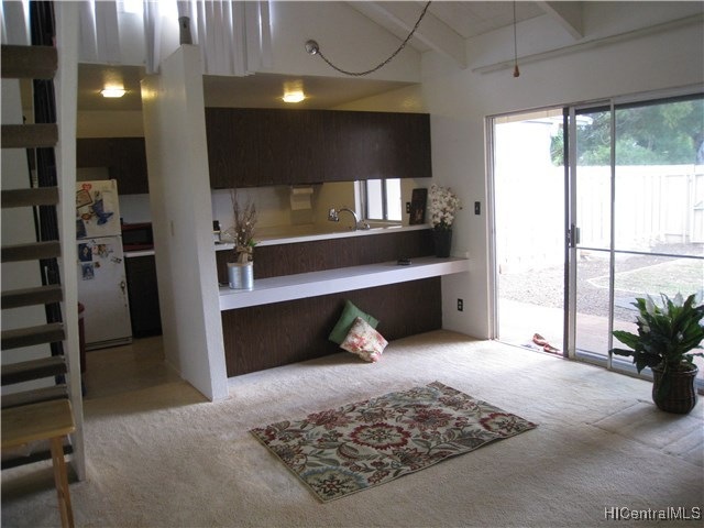 view from the front entrance living room/kitchen/y