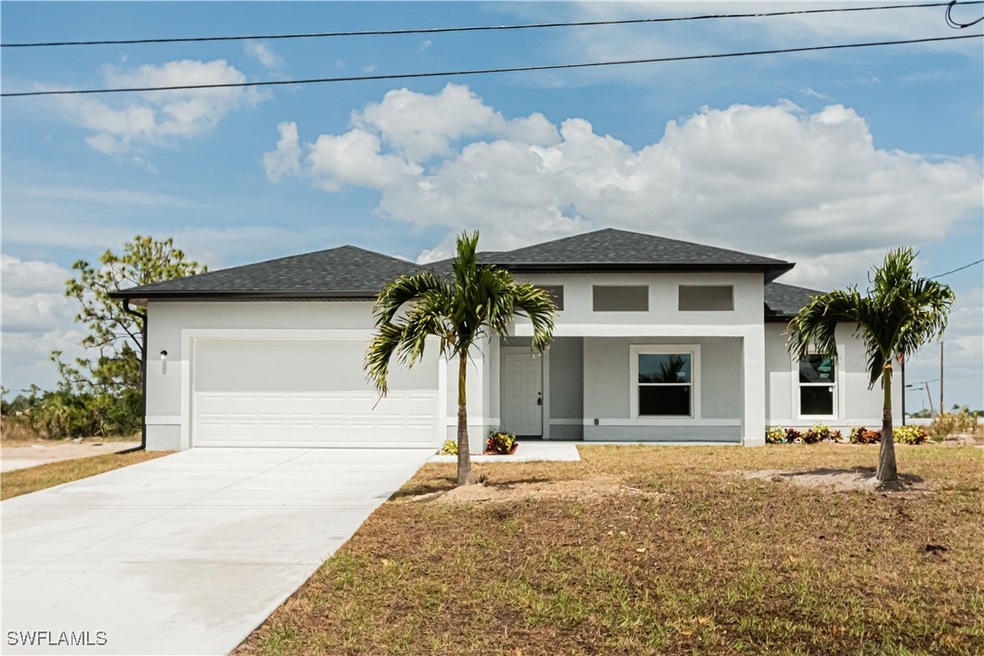 View of front of property with a front yard and a