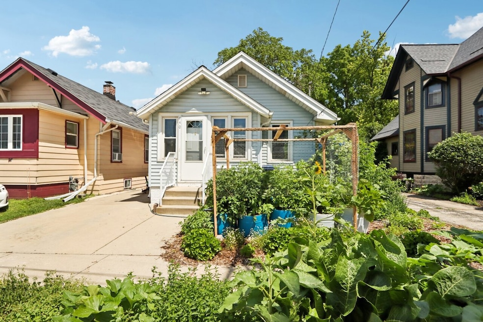 Front Of Home with Gardens