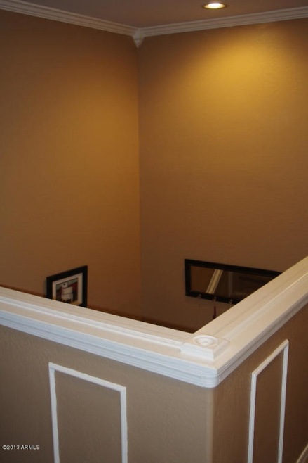 Crown molding on stairwell and ceiling