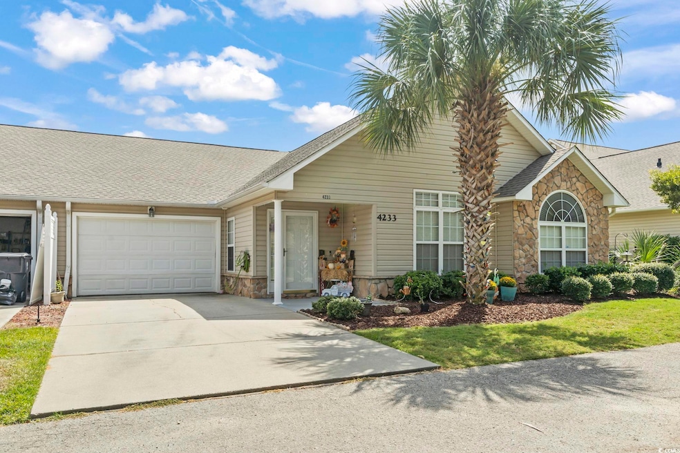 Single story home featuring stone siding, concrete driveway, roof with shingles, and a garage