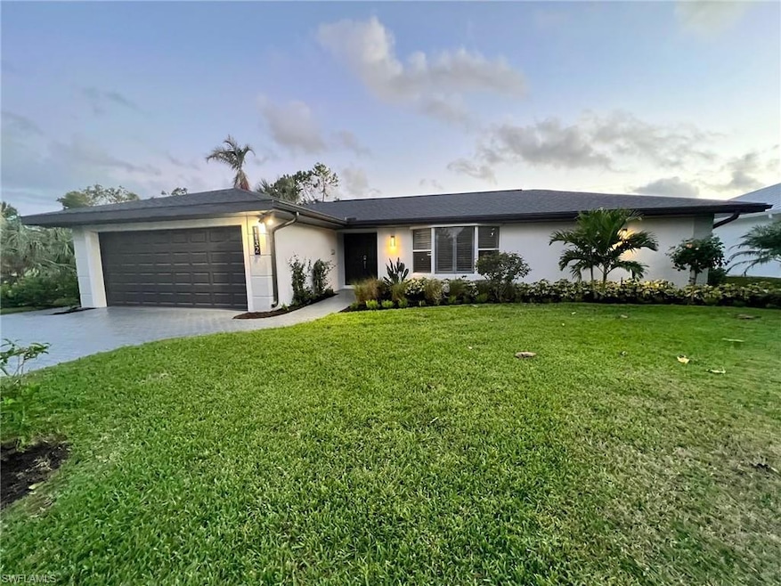 Ranch-style home featuring large 2 car garage