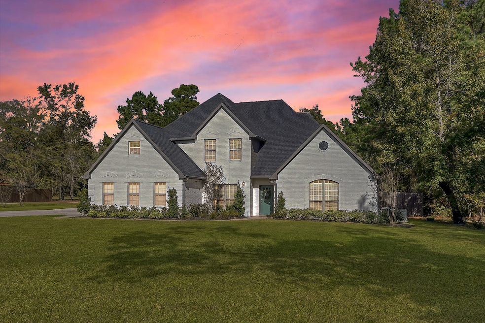 Discover your dream home at 9127 Grand Lake Estates, where elegance meets comfort in a stunning setting.