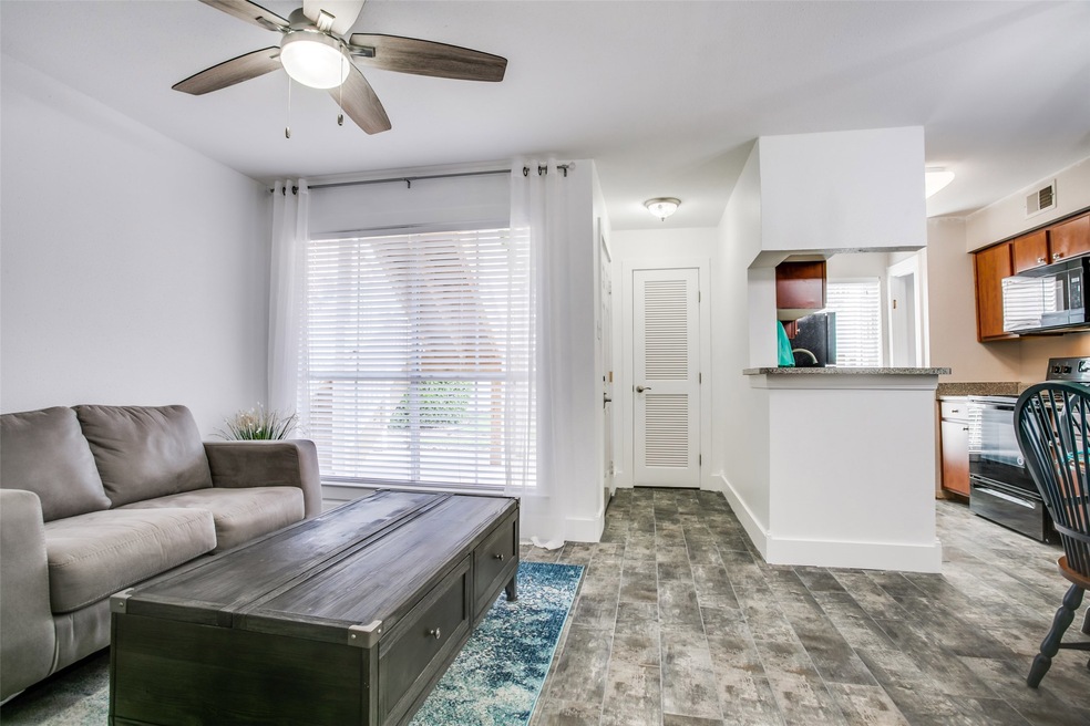 Entry to the condo with open dining area.