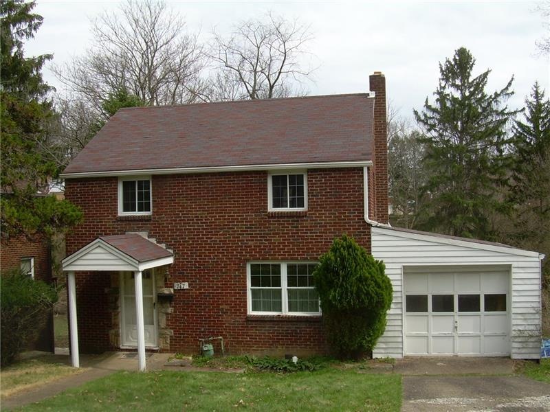 Traditional red brick colonial on a quiet no-outle