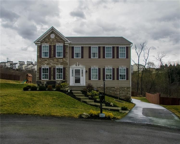 Beautiful stone and vinyl home on a cul de sac