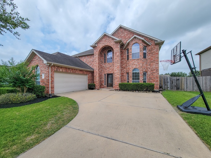 Welcome to your future new home. The long spacious driveway is perfect to play a little basketball and park multiple cars!