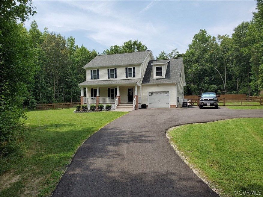 Photos show the same floor plan built by McLaughlin Homes.