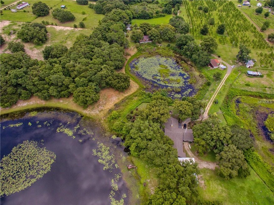Over 15 acres including a Private Lake!